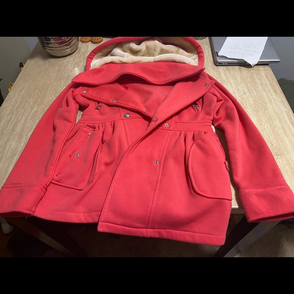 A hot pink jacket